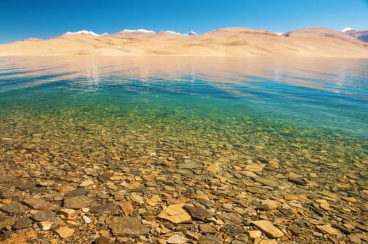 Himalayan mountain lake in Himalayas Tso Moriri, Tsomoriri Wetland Conservation Reserve, Korzok  Changthang area, Ladakh, Jammu and Kashmir, India.