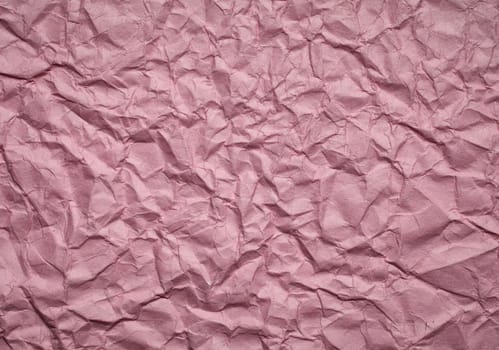 pink Crumpled paper background