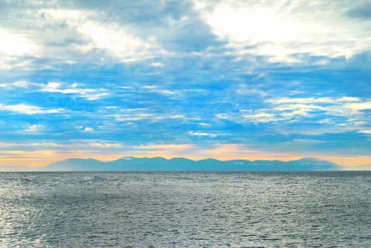 Island in the sea near coast. North Vancouver