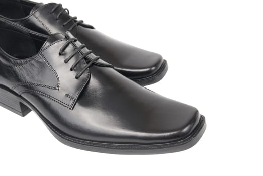 Pair of man's black shoes isolated on white background