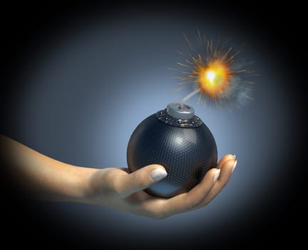 Human hand holding a bomb with burning fuse, on dark background.
