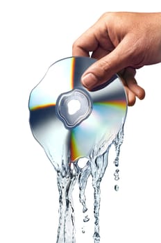 Man hand holding a compact disc whis is melting and morphing into water ripples. Close up view on white background.