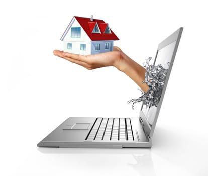 Man's hands, splashing out from a computer laptop screen, holding a house on it.