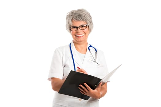Happy old female doctor with hands folded, isolated on white