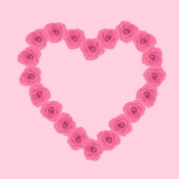 Heart shape pink rose flowers on pink background