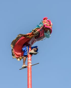 NAKHONSAWAN,THAILAND - FEBRUARY 13: Chinese lion dance performance for Chinese New Year Celebrations on February 13, 2013 in Nakornsawan, Thailand.