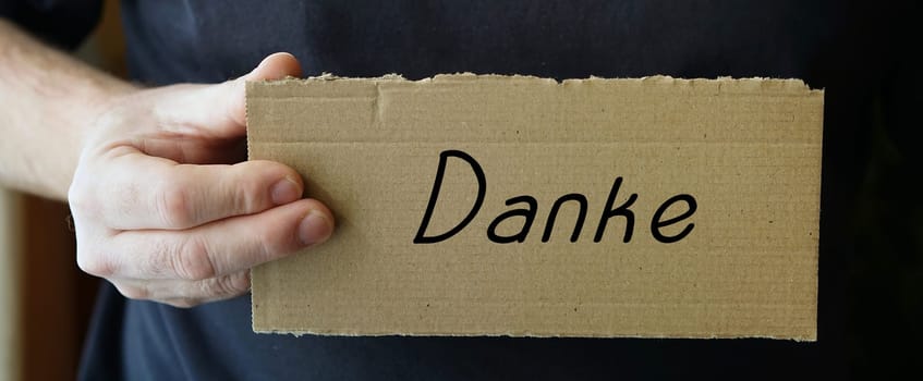 Cardboard sign with the inscription "Thank you"""