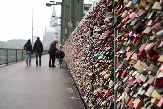Locks of couples in love at the Hohenzollern Bridge in Cologne