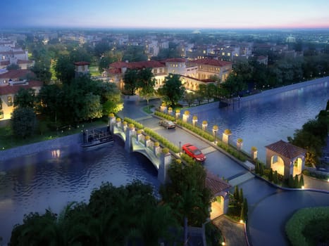 Aerial view of a beautiful village with a bridge in the foreground. Sunset night scene with artificial lights around.