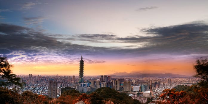 The Taipei, Taiwan city skyline at twilight.