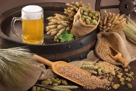 Beer barrel,beer jug with wheat,barley,hops and malt