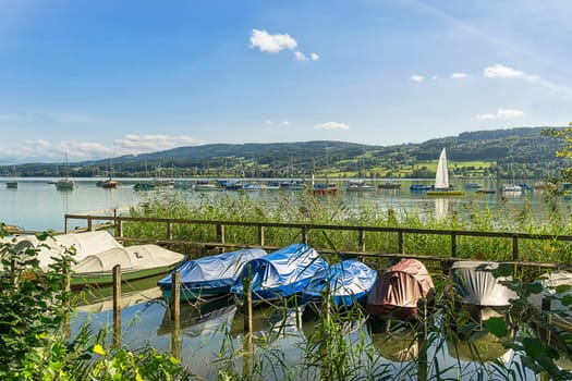 colourfully covered boats at the Greifensee
