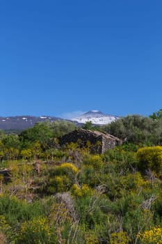 An abandoned house at the foot of Mount Etna