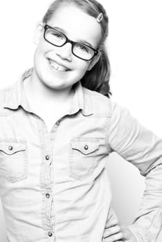 Portrait of a child in the studio against a white background