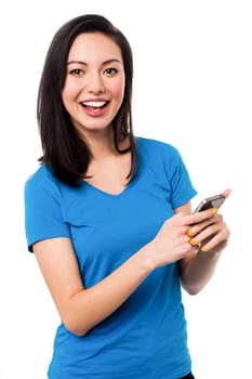 Beautiful smiling lady using smartphone