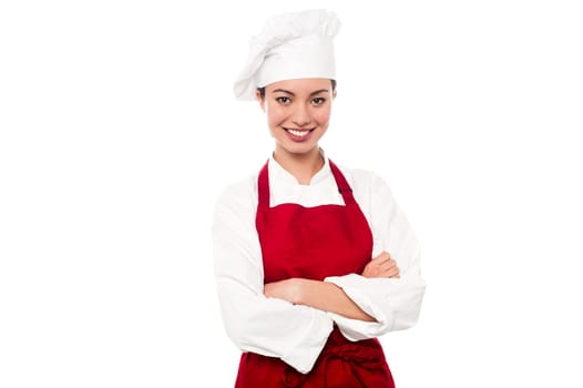 Female chef posing with arms crossed