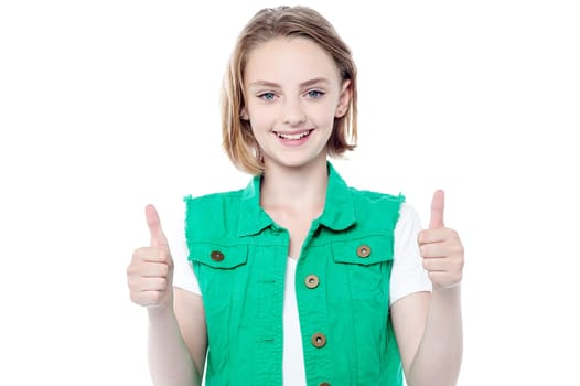 Pretty girl showing double thumbs up