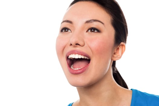 Young woman with wide open mouth