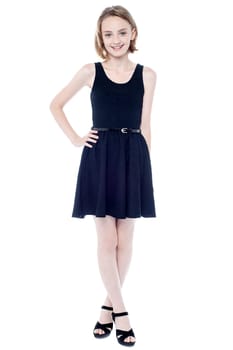 Beautiful girl in black sleeveless dress