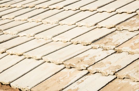 Pattern of tiles on the old roof , stock photo