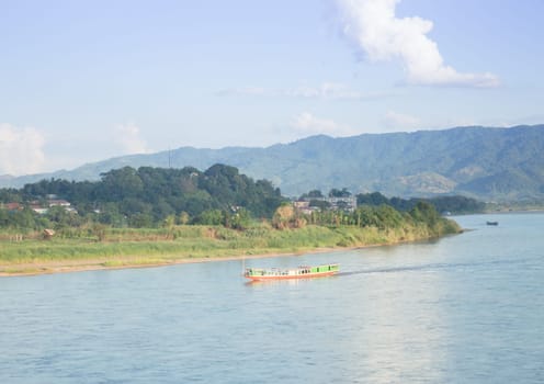 Shipping Lao boat on The Mae khong river, stock photo