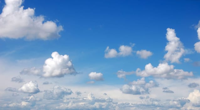 blue sky with cumulous clouds