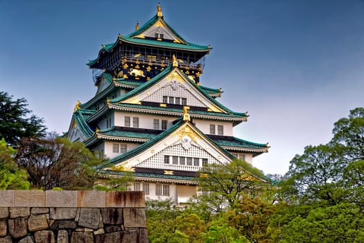 Osaka Castle at sunset in Japan, landmark of Unesco.