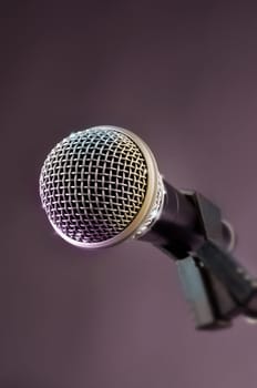 Microphone in a studio with glittering lights and effects