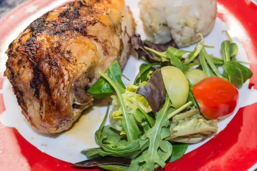 Duck breast fillet with potato dumplings and salad..
