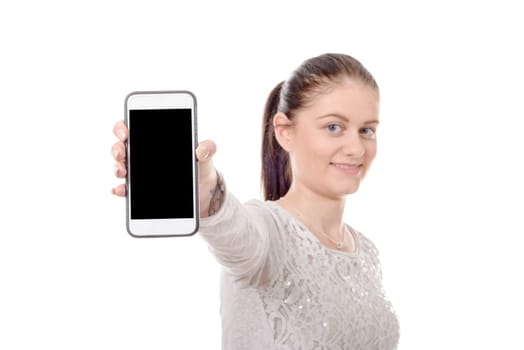 a happy young woman showing blank smartphone screen