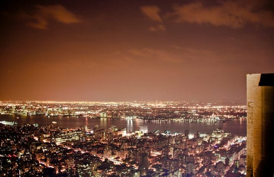 This is a partial view of a city's buildings and structures against the sky in New York from Empire State Building