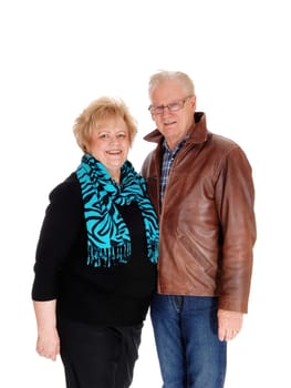 A lovely senior couple standing side by side .isolated for white background..