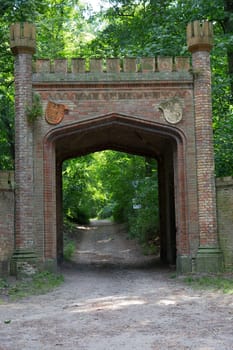 Entrance gate made of brick to the park in Berlin