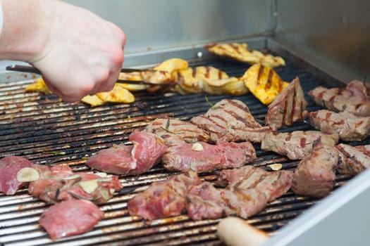Veal and beef on a charcoal grill