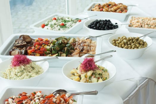 Various salads prepared on a table