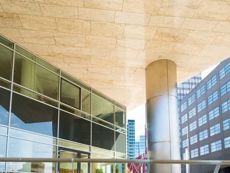 entrance of a modern office building with a pillar