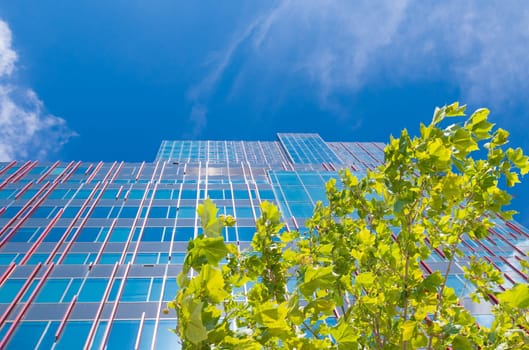 facade of a modern office building in Almere, netherlands. It is the youngest and fastest growing city in the country, founded around 1975.