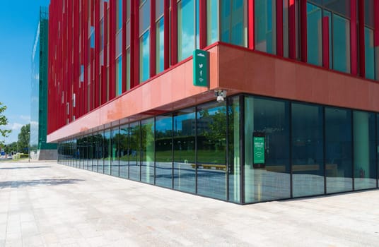 facade of a modern office building in Almere, netherlands. It is the youngest and fastest growing city in the country, founded around 1975.