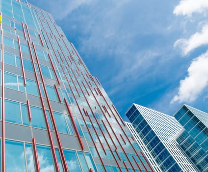facades of modern office buildings in Almere, netherlands. It is the youngest and fastest growing city in the country, founded around 1975.
