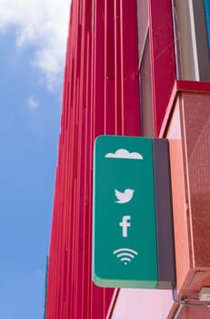 modern office building with social media logo shield