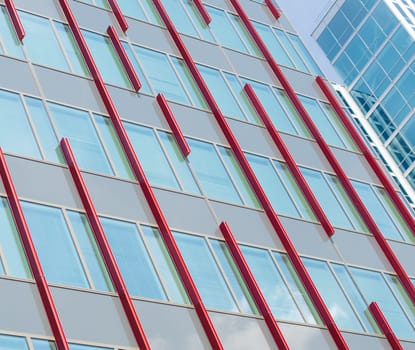 facade of a modern office building in Almere, netherlands. It is the youngest and fastest growing city in the country, founded around 1975.