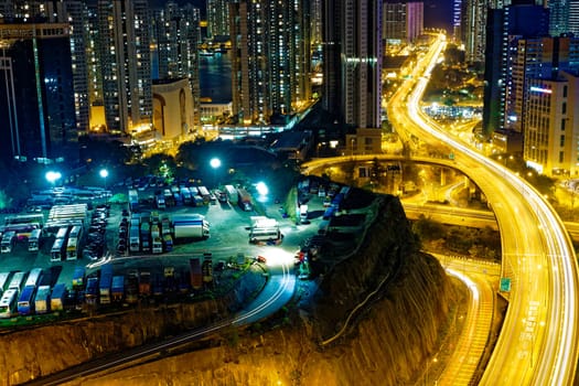 busy traffic night in finance urban, hong kong city