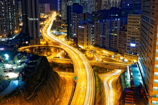 busy traffic night in finance urban, hong kong city