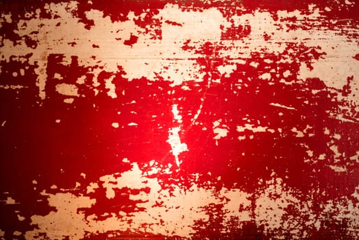 Vintage concept grunge aged wood background with old red paint.