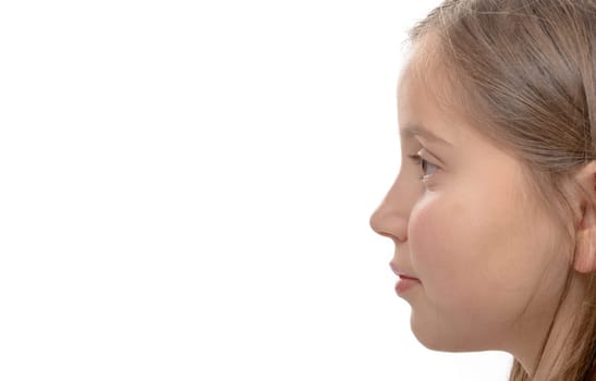 a cute little girl, side view, isolated on white