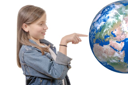 Portrait of a smiling little girl pointing finger on world globe isolated on  white background