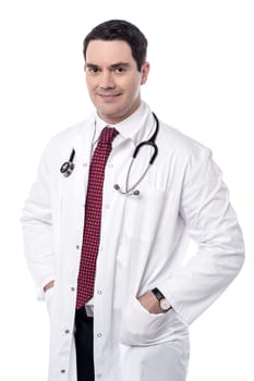 Experienced male doctor posing sideways to camera