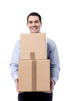 Male delivery man holding cardboard ready to ship
