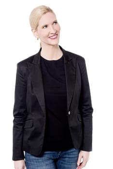 Woman posing in her trendy new wear over white