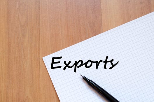 Exports text concept write on notebook with pen